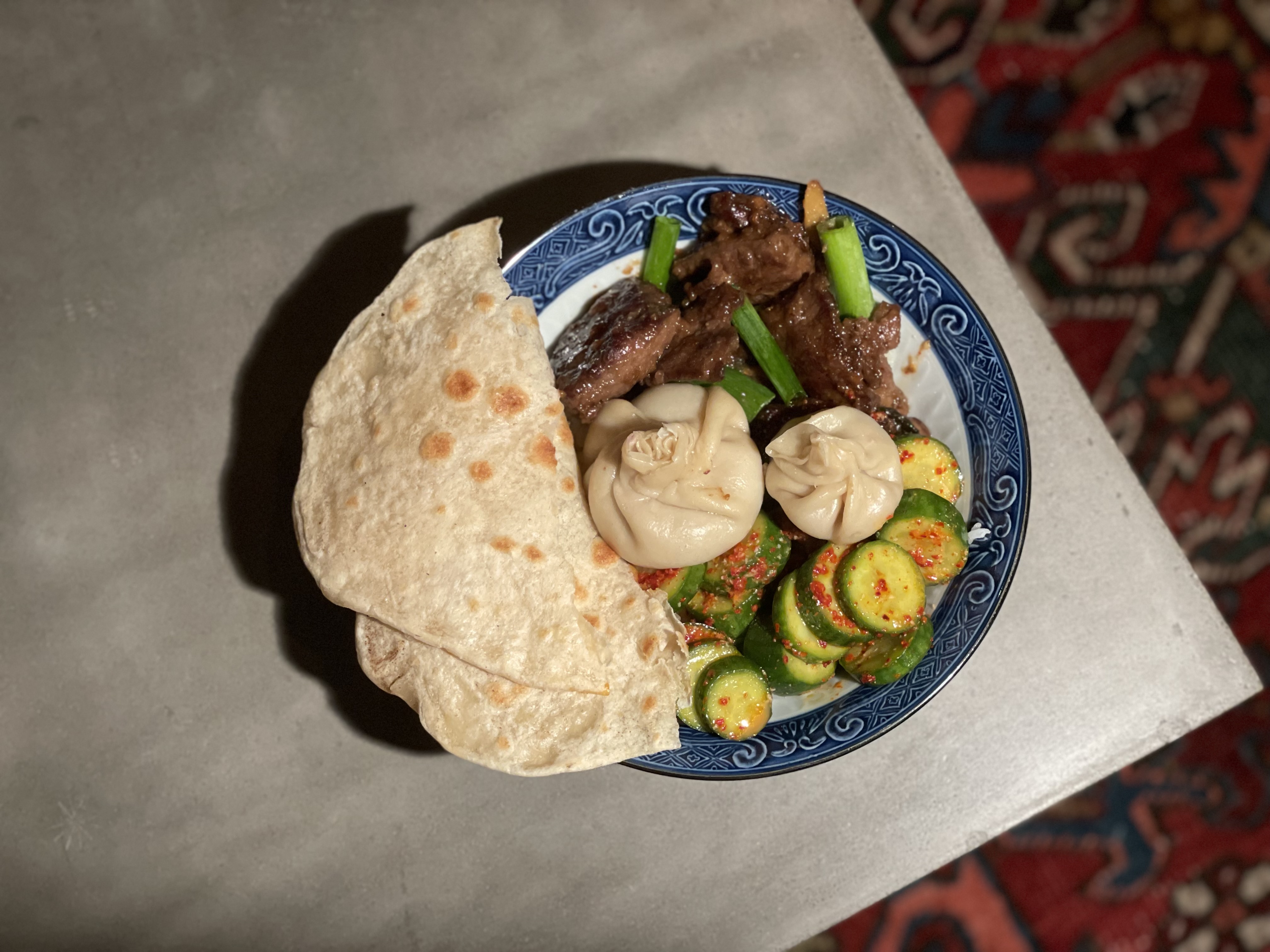 Soft tortillas filled with meat, onions, and cilantro
